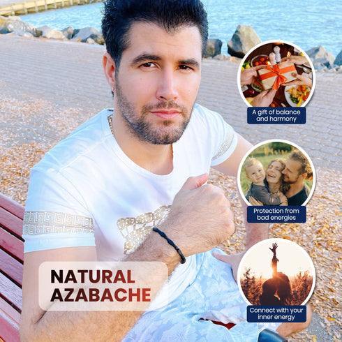 A man sits on a red bench by the water, dressed in a white shirt and pants, featuring a Genuine Azabache Bracelet Unisex Men and Women Adjustable Black Rope. Insets emphasize its benefits: promoting balance and harmony, offering spiritual protection from negative energies, and facilitating a connection with inner energy. It's an ideal piece of jewelry for anyone seeking serenity.