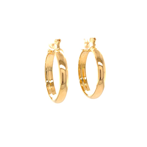 A pair of 1-inch round hoop earrings, designed with a flat inner side and made from 14k gold-filled material that is lead and nickel-free, featuring post and latch back closures, is shown upright against a plain white background.