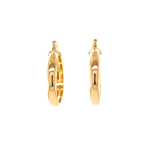 The 1 Inch Round Hoop Earrings, crafted from 14k gold-filled materials and designed to be lead and nickel free, are showcased vertically against a pristine white background.