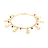 The Teddy Bears Red and Black Lucky Charms Baby Bracelet is a delicate 14k gold-filled piece adorned with small charms, showcasing meticulously arranged red, black, and gold accents along its length, displayed on a white background.