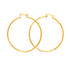A pair of Big 5.4 cm Hoop Earrings in 14k gold-filled with a thickness of 2 mm and simple clasps. These statement pieces elegantly overlap against a plain white background.