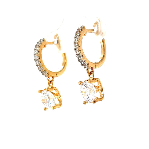 The Beautiful Drop Zirconia Stone Huggie earrings feature rose gold hoops embellished with small clear gemstones and larger square-shaped dangles, making them perfect for any skin type.