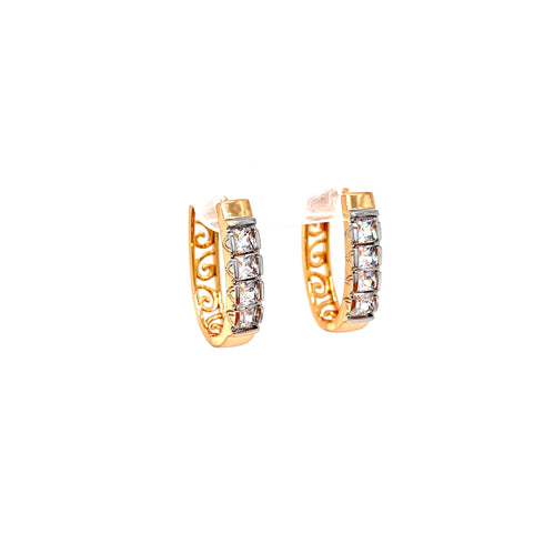 A pair of Huggies Earrings with 4 square-cut cubic zirconia stones, intricately designed with patterns on the sides and expertly crafted in rose gold-filled metal. These earrings are elegantly showcased against a white background.