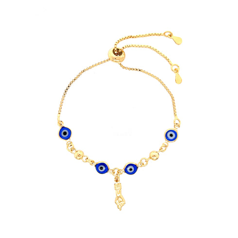 The Blue Evil Eye and Figa Hand Charm Bracelet with its adjustable box chain features a central figa hand charm surrounded by decorative gold beads and three blue beads, embodying spiritual symbolism and protection.