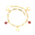 A 14k gold-filled Figaro link chain ankle bracelet adorned with alternating charms of red and white round pendants, gold horseshoes, and a subtle Evil Eye detail, featuring a lobster clasp closure.