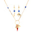 The Mega Lucky Charm Pendant Necklace and Earrings set, crafted with 14K gold-filled materials, showcases captivating blue eye motifs and whimsical elephant charms for protection and luck. The pendant features a striking red horn accentuated by multiple gold designs, while the earrings elegantly mirror the enchanting elephant and eye motifs.