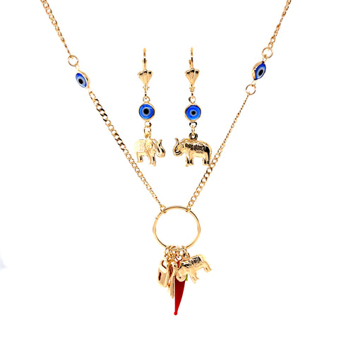 The Mega Lucky Charm Pendant Necklace and Earrings set features an exquisite design with elephant charms and blue evil eye beads. Its 14K gold-filled Cuban link chain adds an elegant touch, while the red horn pendant offers protection and luck.