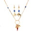 The Mega Lucky Charm Pendant Necklace and Earrings set features an exquisite design with elephant charms and blue evil eye beads. Its 14K gold-filled Cuban link chain adds an elegant touch, while the red horn pendant offers protection and luck.