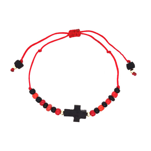 The Genuine Azabache Crucifix Red Rope Bracelet Adjustable Unisex Women and Men showcases a central crucifix bead made of Azabache, complemented by alternating red and black beads, offering spiritual protection with an adjustable cord featuring small black beads at its ends.